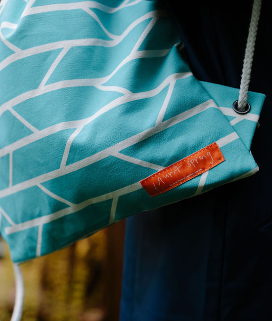 Drawstring Bag – Convergence – Light blue